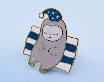 Emaille pin luiaard voor het slapengaan