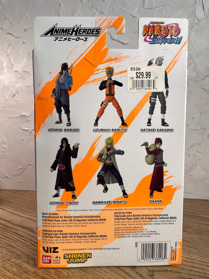 May include: Back of a Naruto Shippuden Anime Heroes action figure package. The package features images of Uchiha Sasuke, Uzumaki Naruto, Hatake Kakashi, Uchiha Itachi, Namikaze Minato, and Gaara.