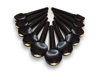 Piroli per oud – Modello svizzero, con intarsio in madreperla o ottone inciso sulla parte superiore.
