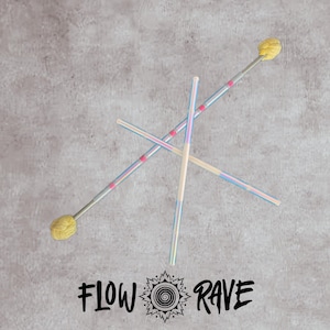 May include: Two flow wands with iridescent shafts, pink accents, and textured yellow ends, crossed over each other. Below the wands, the black text reads FLOW RAVE with a central spiral icon surrounded by a sunburst design on a grey background.