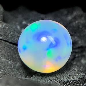 White with rainbow fire natural Ethiopian opal sphere , 2.55 carats loose Opal, untreated stunning ring size gemstone,