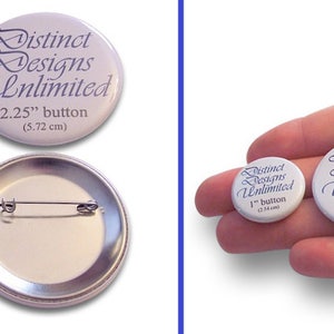 May include: Three round white buttons with blue text reading Distinct Designs Unlimited, available in 1 inch, 1.5 inch, and 2.25 inch sizes. The buttons feature metal pin backs and are shown alongside a US quarter for scale reference.