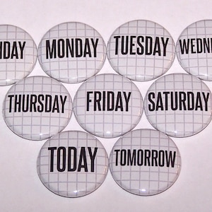 May include: Set of ten white round buttons with black text. The buttons feature the days of the week, "Today", and "Tomorrow".