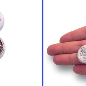 May include: Two white round buttons with black text. The larger button is 1.5 inches in diameter and reads "Distinct Designs Unlimited 1.5" button (3.81 cm)". The smaller button is 1 inch in diameter and reads "Distinct Designs Unlimited 1" button (2.54 cm)".