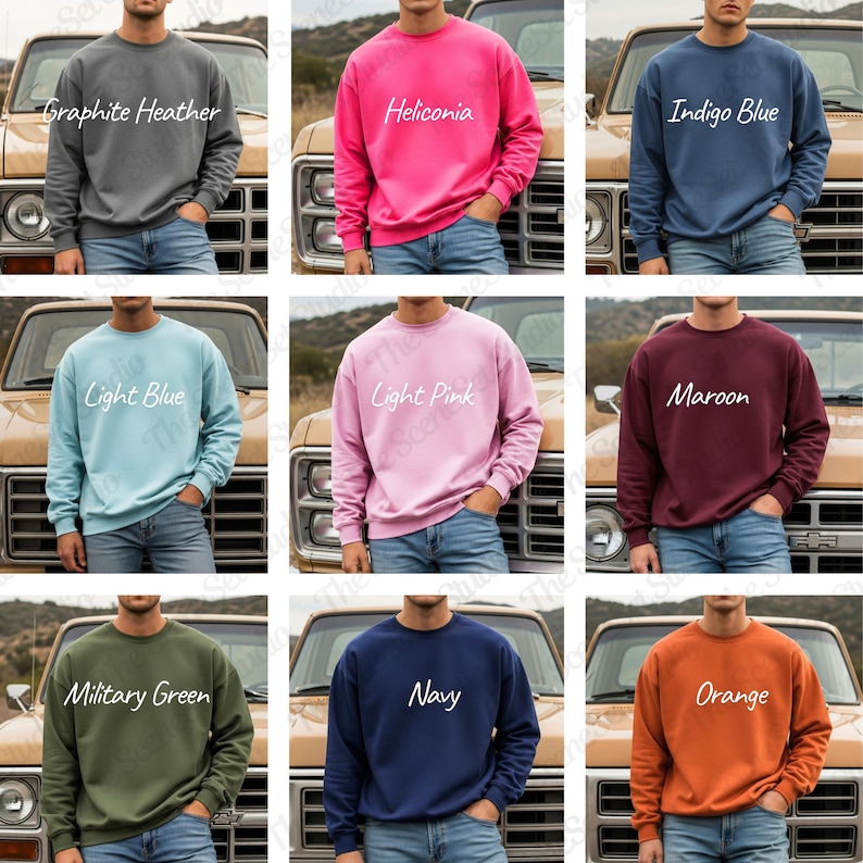 May include: A collection of nine crewneck sweatshirts in various colors, including gray, pink, and blue. Each sweatshirt has a different color name printed on it in white script. The sweatshirts are displayed on a person in front of a vintage truck.