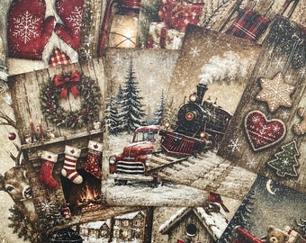 May include: A collection of rectangular Christmas-themed cards featuring vintage illustrations of red mittens, a lantern, wrapped gifts, a sled, a wreath, stockings, a steam train, a red truck, a birdhouse, and a mug with the text Warm Wishes.