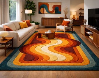 May include: A retro-style area rug with a wavy pattern in shades of orange, yellow, and brown, bordered by a teal blue. The rug is placed in a living room with a sofa, chair, and wooden furniture, creating a warm and inviting atmosphere.