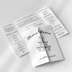 Könnte beinhalten: Eine weiße Hochzeitseinladungssuite mit handgeschriebenem Text. Die Einladung enthält Details über die Zeremonie, den Empfang und die Hochzeitsgesellschaft. Die Namen "Olivia & Kevin" sind prominent dargestellt, zusammen mit einer Kuchenillustration.