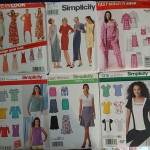 May include: A collection of six sewing pattern envelopes from New Look, Simplicity, and McCall's. Each envelope displays illustrations of various clothing items including dresses, skirts, tops, and pajama sets, along with brand logos and product codes.
