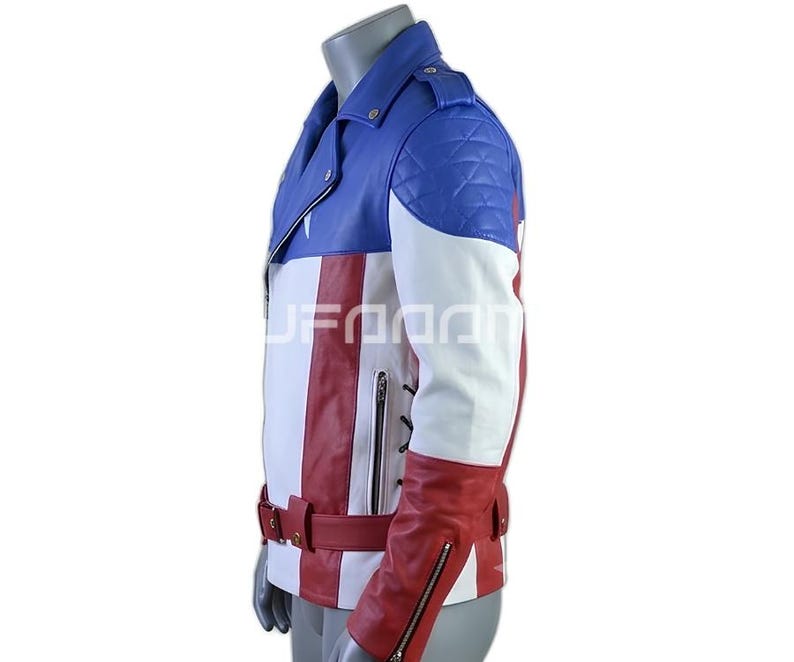 May include: A motorcycle-style jacket featuring a color-blocked design in red, white, and blue. The garment includes a notched lapel, quilted shoulder panels, a waist belt with a buckle, zippered side pockets, and zippered cuffs on the long sleeves.