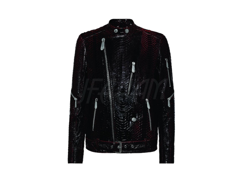 May include: A black leather biker jacket with a textured, snakeskin-like pattern. The jacket features multiple silver zips, a snap-down collar, and a belt at the waist. The jacket is a dark burgundy colour.