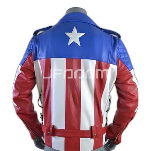 May include: A motorcycle-style jacket featuring a blue upper back with a white star, and a lower back with vertical red and white stripes. The sleeves are red with blue quilted shoulder panels, and the waist includes a red belt with gold buttons.