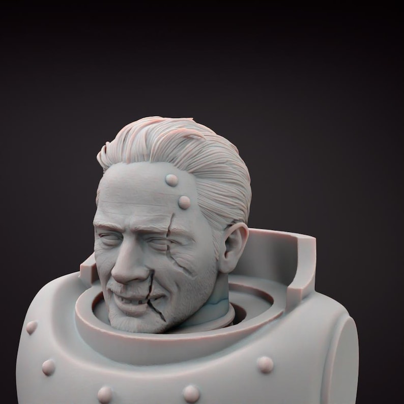 May include: A light grey bust of a man with a stern expression, featuring detailed facial features and scars. The bust is set within a light grey, rounded collar with visible rivets. The man's hair is styled back, and the overall aesthetic suggests a futuristic or sci-fi theme.