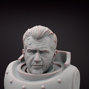 May include: A light grey bust of a man with a serious expression. The sculpture shows detailed facial features, including wrinkles and a scar. The bust is set within a rounded collar with rivet details.