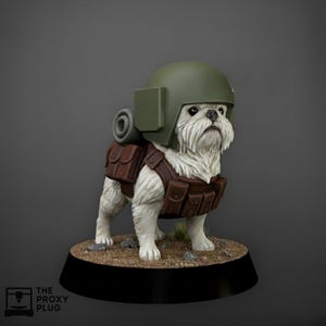May include: A figurine of a white dog wearing a green helmet, brown tactical vest, and a small backpack. The dog stands on a base with a black border and a textured surface. The figurine has a serious expression.