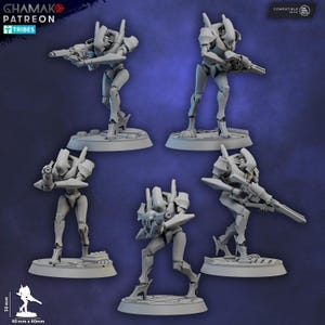 May include: Five grey robot figurines in dynamic poses, each armed with a weapon. The figures stand on circular or rectangular bases. The image features the text "GHAMAK PATREON TRIBES" and a size indicator of 40mm x 40mm.
