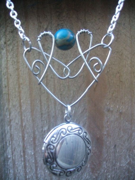 Items similar to blue bead and wire locket necklace on Etsy