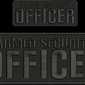 May include: Two black rectangular patches with the words "ARMED SECURITY OFFICER" in large, block letters. The text is embossed, and the patches have a textured appearance. One patch is smaller than the other.