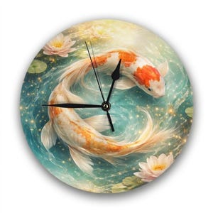 May include: Round wall clock featuring a koi fish design. The clock face depicts two orange and white koi fish swimming in a pond with water lilies. The background is a mix of blue, green, and yellow hues.