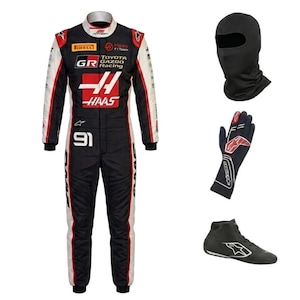 May include: A black, white and red racing suit featuring Toyota Gazoo Racing and Haas branding with the number 91, accompanied by a black balaclava, a black racing glove with red accents, and a black racing shoe with a white logo.