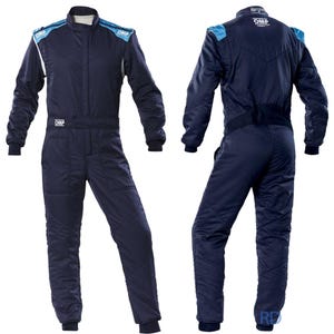 May include: Navy blue racing suit with light blue shoulder accents and white trim. The suit has long sleeves, a high collar, and the brand name "OMP" is visible. The suit is designed for motorsports.