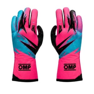 May include: A pair of racing gloves featuring a vibrant pink and bright blue abstract pattern with sharp black accents. The OMP logo is printed in black on the wrist cuff and on the back of the hand. The palms and fingers are finished in solid black.