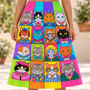 May include: A midi skirt featuring a vibrant grid pattern of sixteen distinct cat illustrations. Each cat is depicted in a unique outfit, including bow ties, hats, and patterned shirts, set against a colorful background of polka dots and solid blocks.