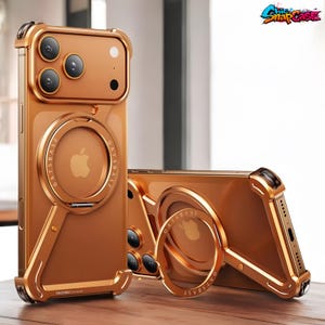 Può includere: Custodia per telefono color oro con supporto ad anello e protezione fotocamera. La custodia ha una finitura metallica e un anello integrato per una presa sicura. Il logo Apple è visibile sul retro. La custodia protegge da graffi e cadute.