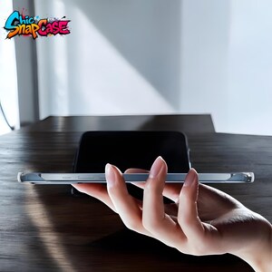 May include: A clear phone case held in a hand, with a black phone in the background. The case has a slim profile and a transparent design. The logo "Chic Snap Case" is visible in the upper left corner, featuring colorful graffiti-style lettering.