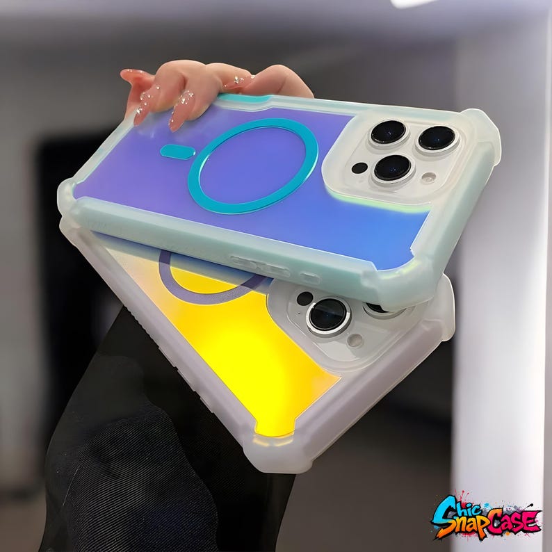 May include: Two iridescent phone cases, one stacked on top of the other. The top case has a blue and purple gradient with a teal circle and a white border. The bottom case has a yellow gradient. The cases have a camera cutout.
