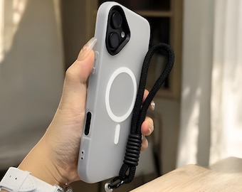 May include: A light gray phone case with a black lanyard. The case has a white circular design and a black camera area. The lanyard is black and attached to the case with a black metal clasp. The brand name "Chic SnapCase" is visible in the bottom right corner.