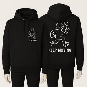 Peut inclure: Sweat à capuche noir avec un motif blanc d'une silhouette en mouvement. Le devant affiche "GET ACTIVE", le dos "KEEP MOVING". Le sweat a une poche avant et une capuche à cordon.