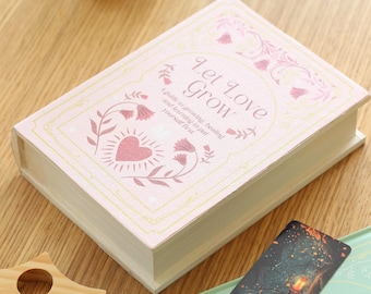 Pink book-shaped box with gold details - decorative storage