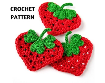 May include: Three crocheted strawberry shapes, each with a green leaf and red body. The strawberries are made with red yarn and black beads for the seeds. The leaves are made with green yarn. The strawberries are arranged in a cluster on a white background. CROCHET PATTERN is written in black text above the strawberries.