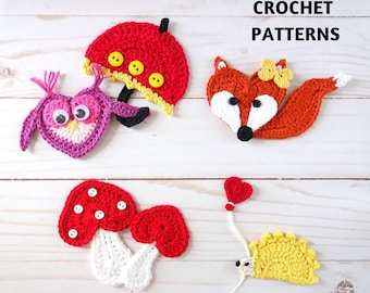 May include: Crochet patterns for a red mushroom, a yellow hedgehog with a red heart balloon, a red umbrella, a purple owl, and an orange fox with a yellow flower. The patterns are displayed on a white wooden background with the text "CROCHET PATTERNS" and "GoldenLucyCrafts".