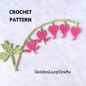 May include: Crochet pattern for a bleeding heart flower. The pattern includes a green stem and leaves, and pink bleeding heart flowers with white centers.