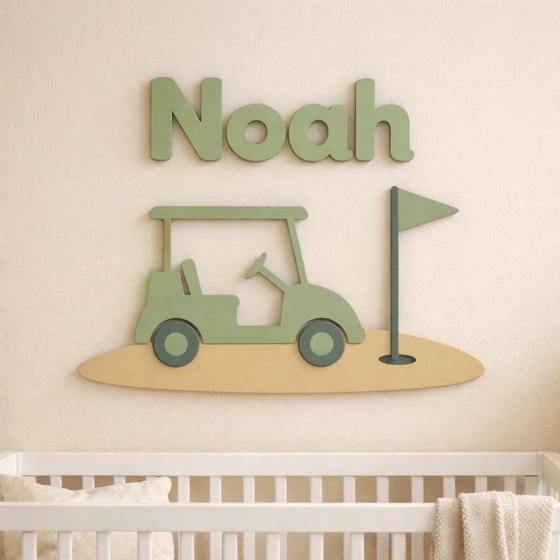 May include: A wall-mounted wooden sign featuring the name Noah in sage green letters above a cutout of a golf cart and a golf flag on a tan base. The golf cart is sage green with dark green wheels, and the flag is sage green on a dark green pole.