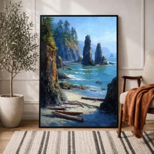 May include: A framed landscape painting depicting a coastal scene with tall, dark rock formations rising from blue water. The foreground features a sandy beach scattered with driftwood logs, while the background shows cliffs with green trees.