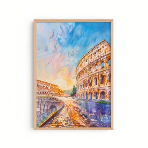 May include: Watercolor painting of the Colosseum in Rome, Italy, framed in a light wood. The artwork depicts the ancient amphitheater under a vibrant sky with shades of blue, pink, and yellow. The painting captures the architectural details and the play of light and shadow.
