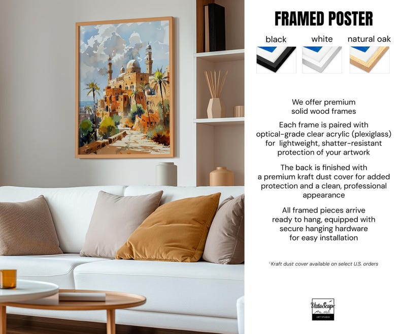 a living room with a white couch and a painting on the wall