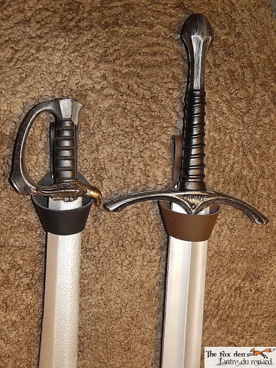 Universal ring holder for: axes maces swords daggers or anything that fits!
