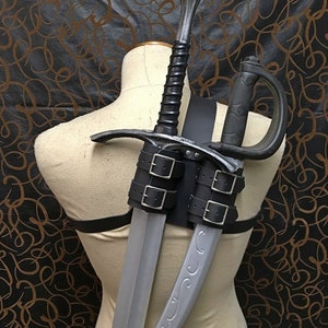 Witcher luxury double back scabbard for metals or latex swords. Made of high quality leather, perfect for your costume or cosplay!
