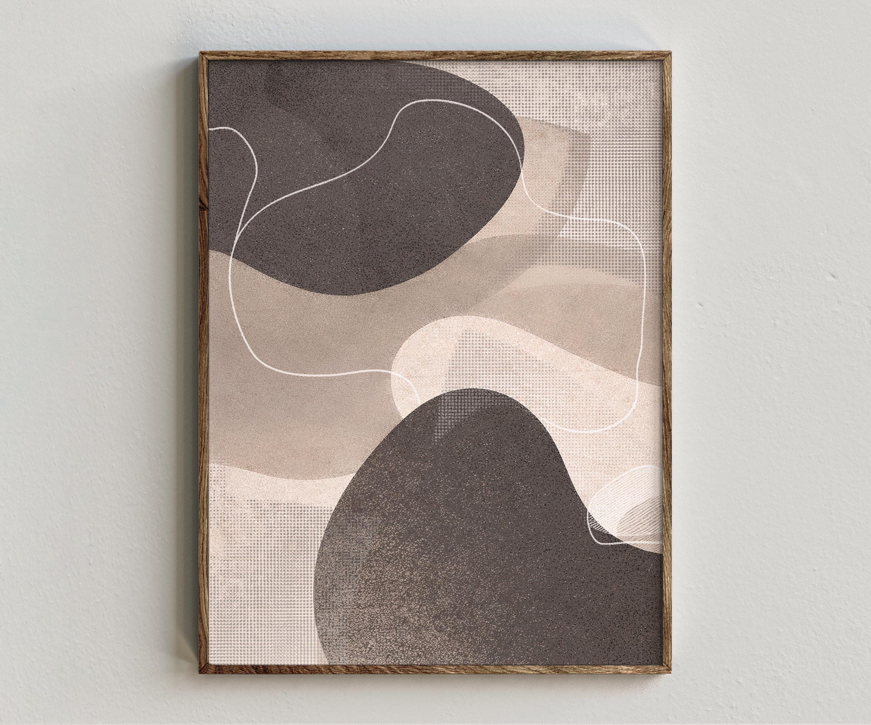 Framed artwork “Synergy - Greige” showing neutral abstract composition with greige organic forms, charcoal contrast, white linework, and soft textured movement on a white wall.