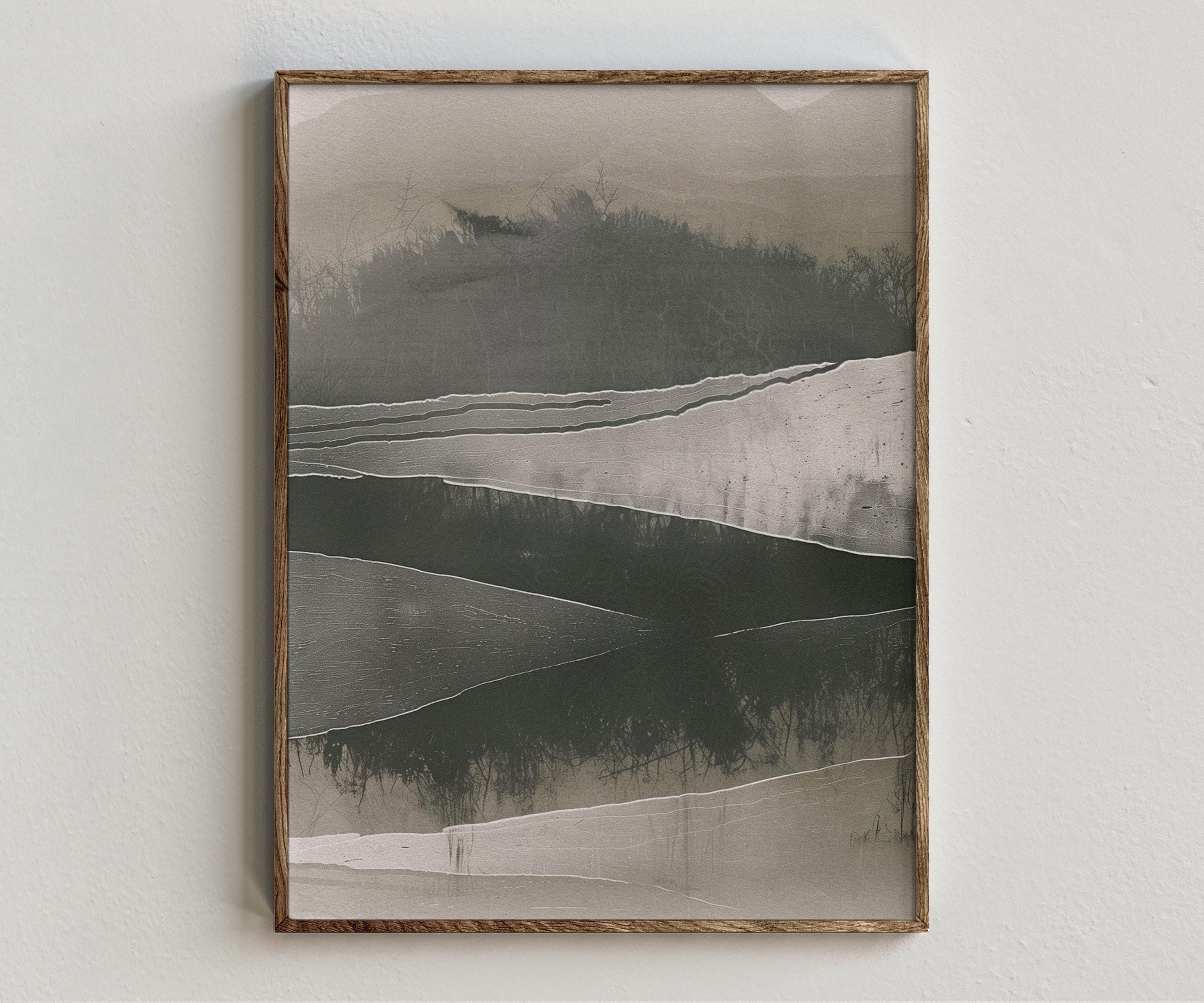 Framed artwork “Moss Construct” showing moss green abstract composition with layered green-grey forms, soft horizontal contrast, and textured organic modern style on a white wall.