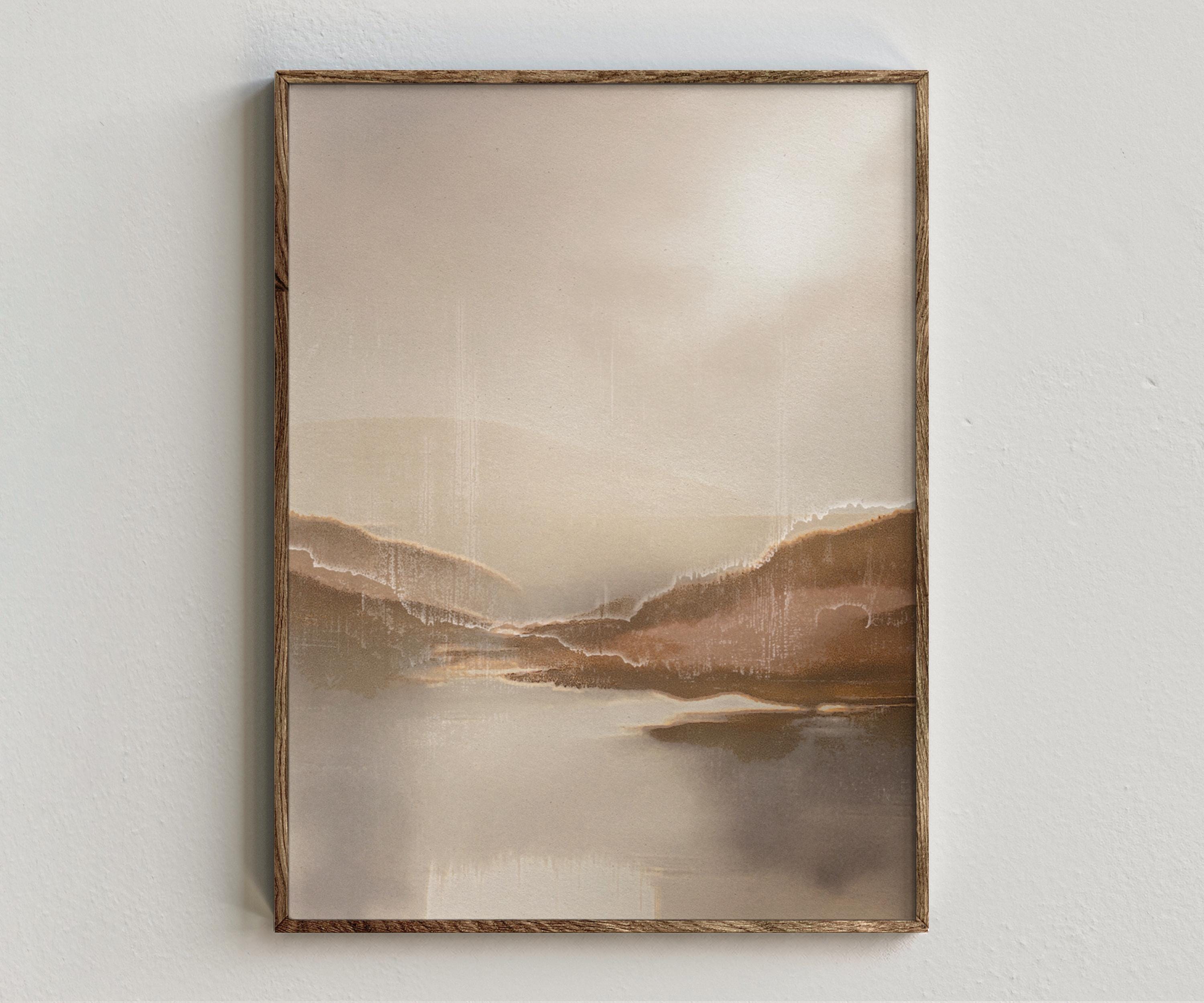 Framed artwork “Sugi Lake” showing japandi lake landscape composition with muted clay tones, soft mountains, and hazy textured depth on a white wall.