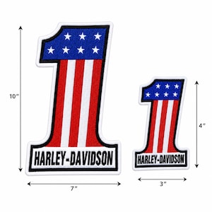 May include: Two embroidered patches shaped like the number one, featuring a blue top section with white stars and red and white vertical stripes below. Both patches display the text HARLEY-DAVIDSON. The larger patch measures 10 inches by 7 inches, and the smaller patch measures 4 inches by 3 inches.