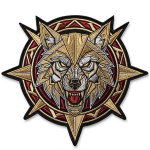 May include: An embroidered patch featuring a stylised wolf head in gold, silver, and black threads. The wolf is centred within a circular frame with red accents and eight radiating points, creating a star-like shape with a black border.