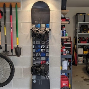 Snowboard wall mount