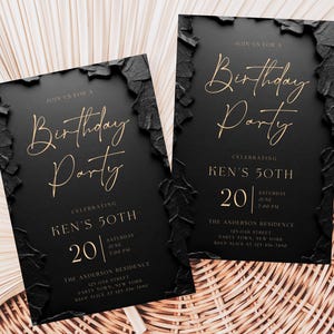 May include: Two rectangular birthday party invitations with a matte black finish and textured, jagged black edges. The text is printed in gold, featuring the words Birthday Party, Celebrating Ken's 50th, Saturday June 20, and address details.