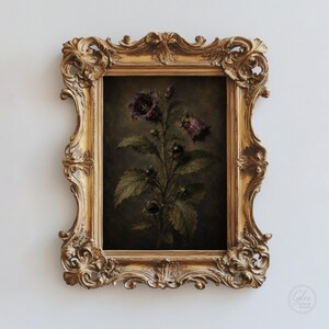 May include: A rectangular wall art piece featuring a dark botanical illustration of a flowering plant with deep purple bell-shaped blossoms and green leaves, encased in an ornate, heavy gold-colored frame with intricate scrollwork and carvings.